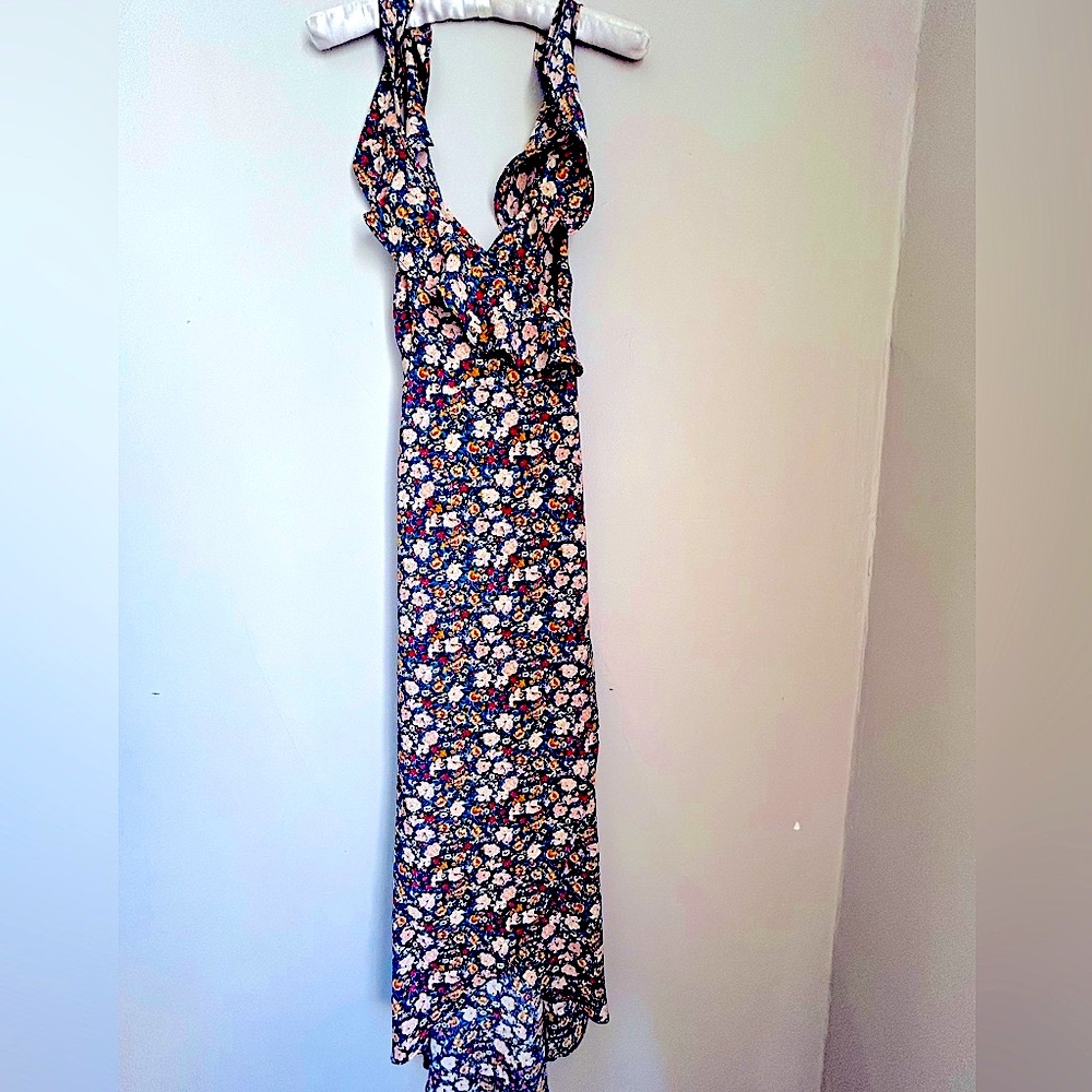 A Wyldr Criss cross sundress with side zipper and open back